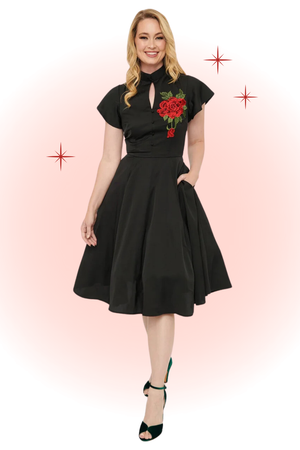 Vestido acampanado de flor de pascua negro